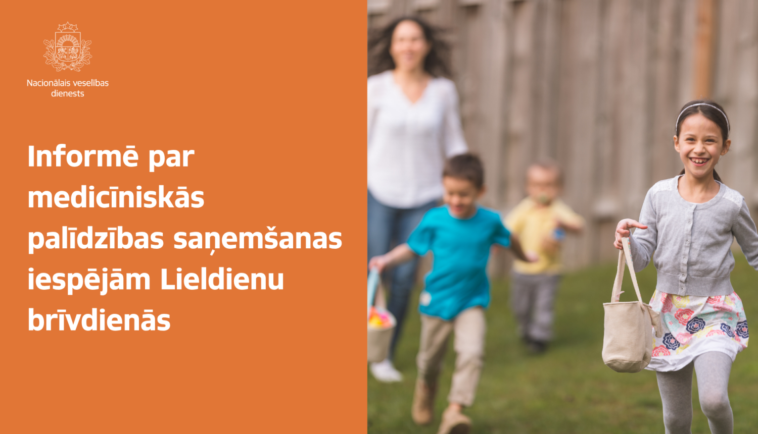 baneris ar uzrakstu "informē par medicīniskās palīdzības saņemšanas iespējām Lieldienu brīvdienās" fonā skrienoši bērni